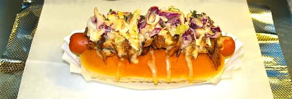 Pulled pork dawg topped with slaw